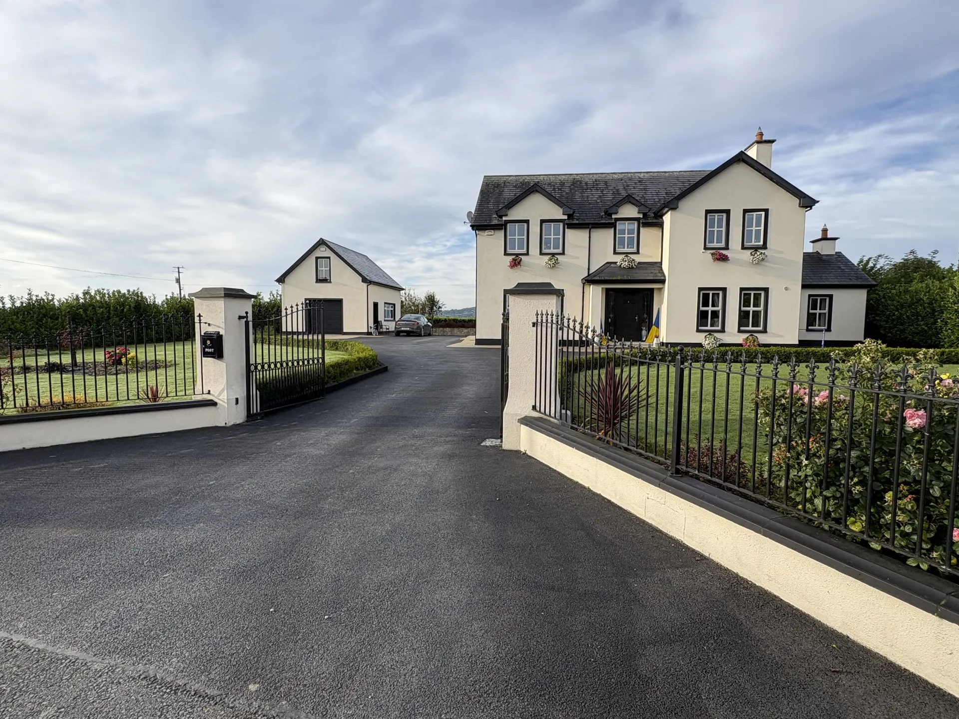 Golf Lodge exterior at dusk — the private gated country residence near Adare