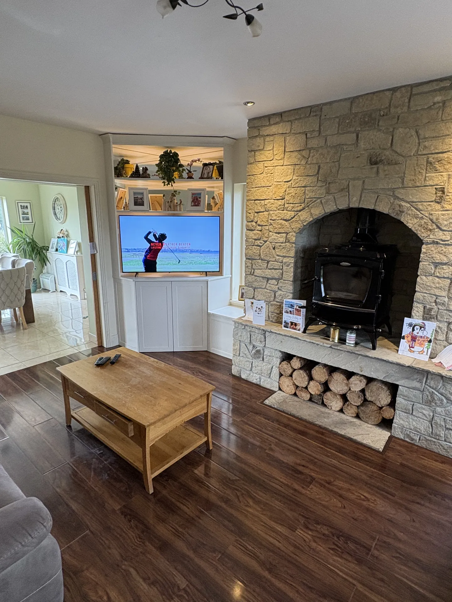 Golf Lodge main lounge with stone fireplace